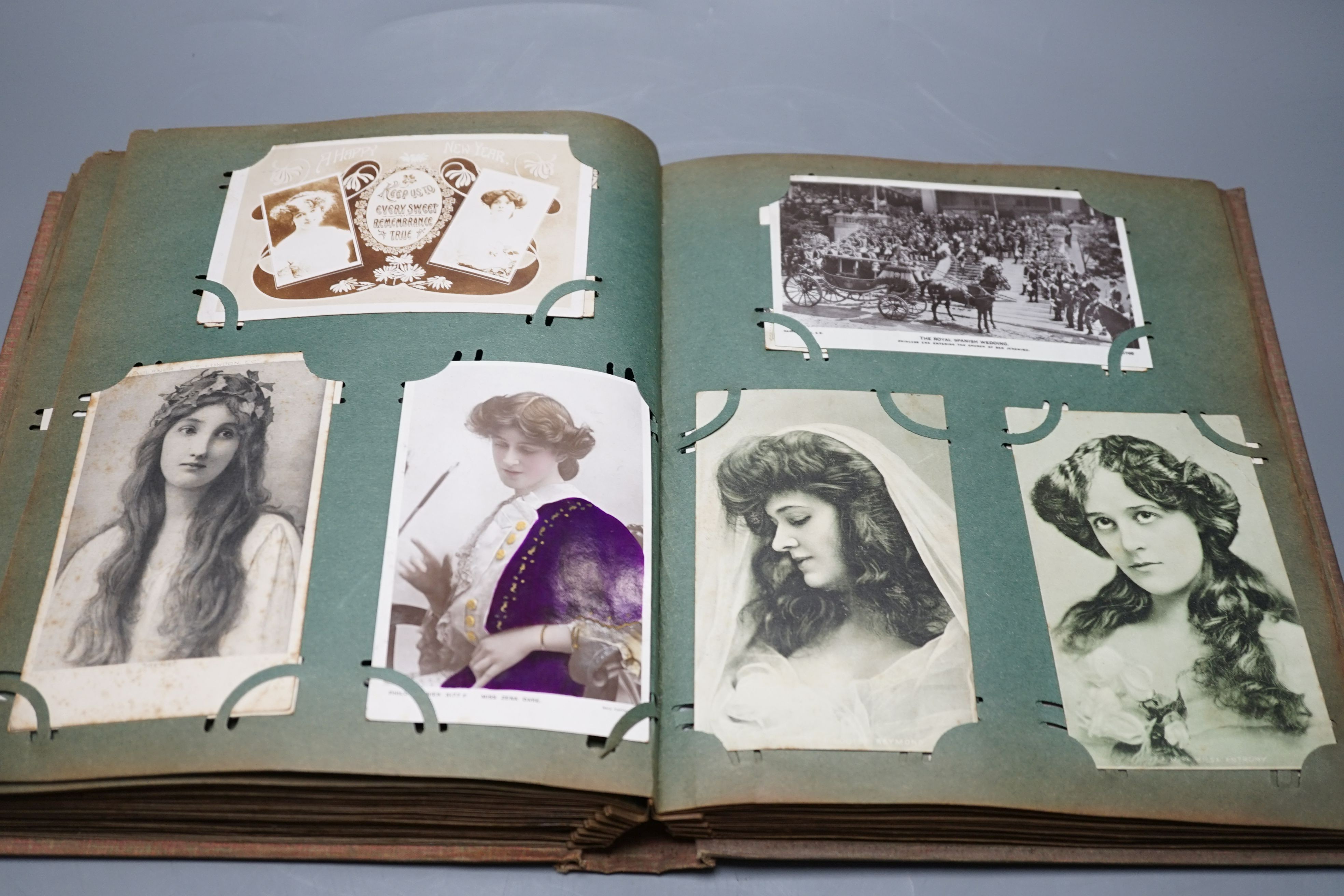 Three postcard albums and contents
